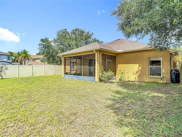 3824 Duke Firth St, Land O Lakes, FL 34638 - back of house featuring a sunroom, stucco siding, and a ceiling fan
