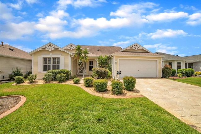 17567 SE 81st Parnassus Ct, The Villages, FL 32162 - view of front of home featuring a garage, a front lawn, and driveway