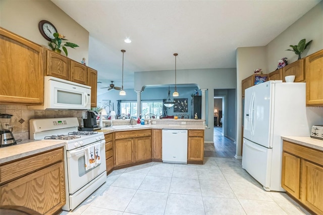17567 SE 81st Parnassus Ct, The Villages, FL 32162 - kitchen featuring white appliances, a ceiling fan, light countertops, and a sink