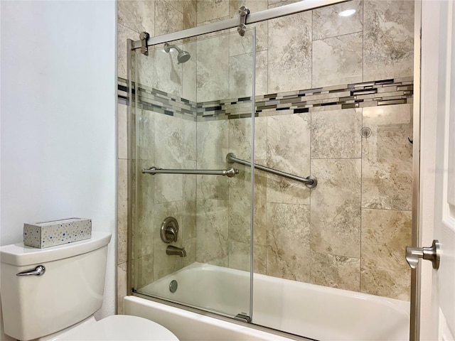 100 Bluff View Dr Unit 115C, Belleair Bluffs, FL 33770 - bathroom with toilet and enclosed tub / shower combo