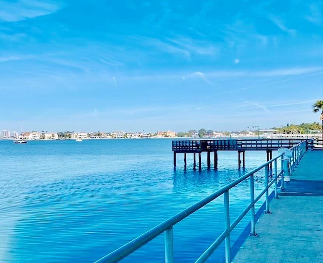100 Bluff View Dr Unit 115C, Belleair Bluffs, FL 33770 - dock featuring a water view