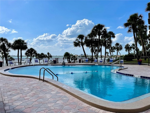 100 Bluff View Dr Unit 115C, Belleair Bluffs, FL 33770 - community pool featuring a patio area