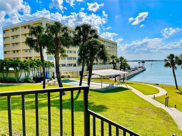 100 Bluff View Dr Unit 115C, Belleair Bluffs, FL 33770 - view of community featuring a water view and a yard