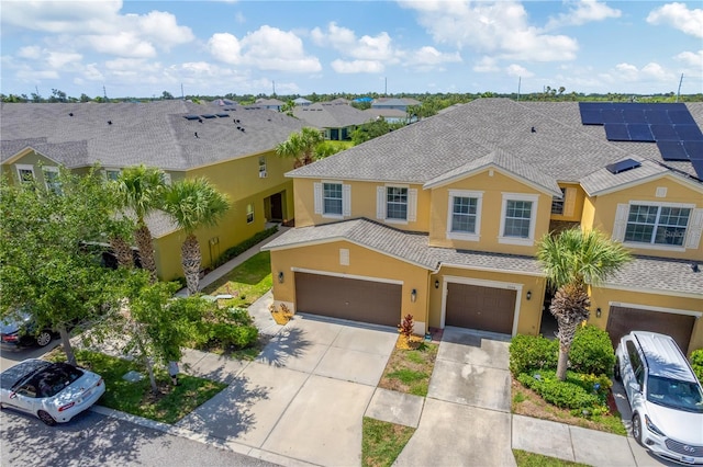 2022 Hawks View Dr, Ruskin, FL 33570 - townhome / multi-family property featuring stucco siding and driveway