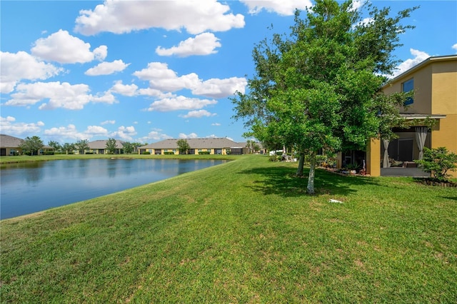2022 Hawks View Dr, Ruskin, FL 33570 - view of grassy yard with a water view and a residential view