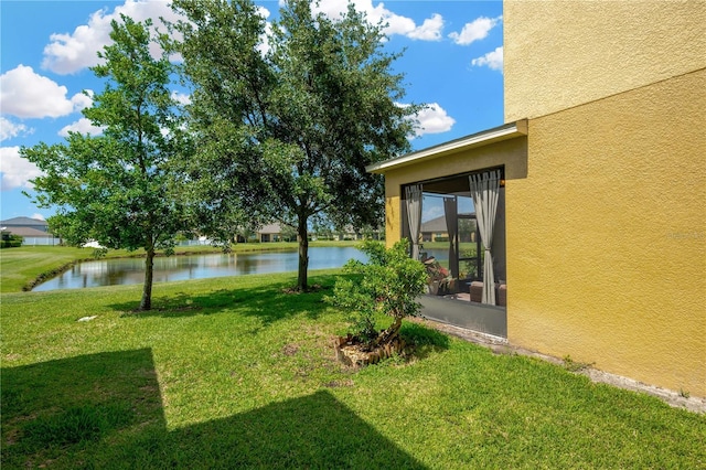 2022 Hawks View Dr, Ruskin, FL 33570 - view of green lawn with a water view