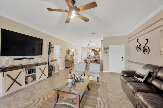 2022 Hawks View Dr, Ruskin, FL 33570 - living room featuring a ceiling fan, crown molding, and light tile patterned floors