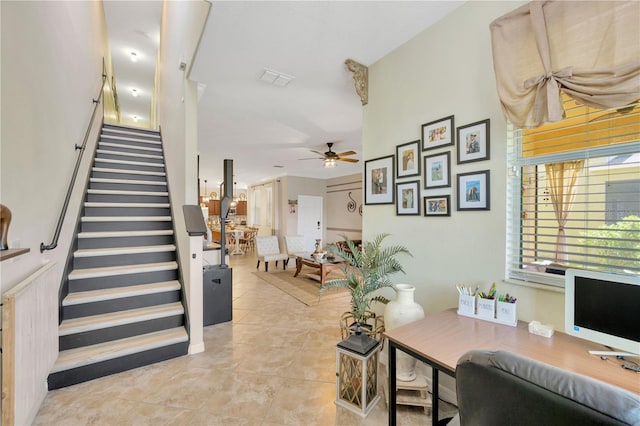 2022 Hawks View Dr, Ruskin, FL 33570 - stairway with a ceiling fan and tile patterned flooring