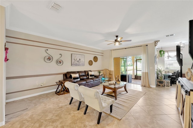 2022 Hawks View Dr, Ruskin, FL 33570 - living area featuring ceiling fan, ornamental molding, and light tile patterned floors