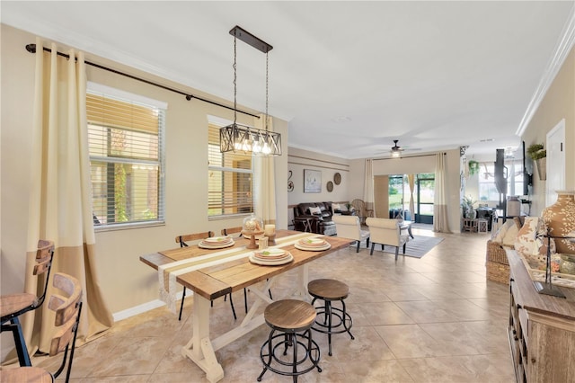 2022 Hawks View Dr, Ruskin, FL 33570 - dining room with crown molding, ceiling fan, and light tile patterned flooring