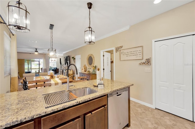 2022 Hawks View Dr, Ruskin, FL 33570 - kitchen with stainless steel dishwasher, a chandelier, pendant lighting, light tile patterned floors, and a ceiling fan