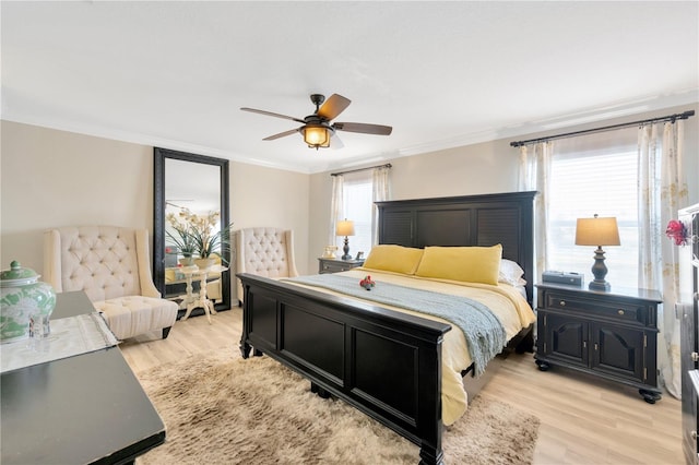 2022 Hawks View Dr, Ruskin, FL 33570 - bedroom with crown molding, light wood-style floors, and ceiling fan