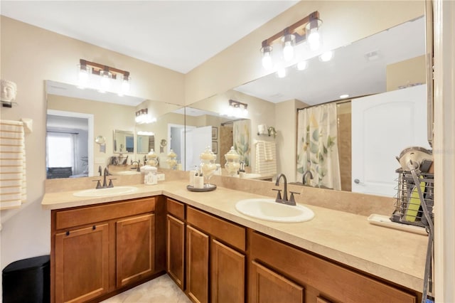 2022 Hawks View Dr, Ruskin, FL 33570 - bathroom with double vanity, curtained shower, and tile patterned flooring