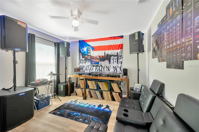 2022 Hawks View Dr, Ruskin, FL 33570 - sitting room with ceiling fan and wood finished floors