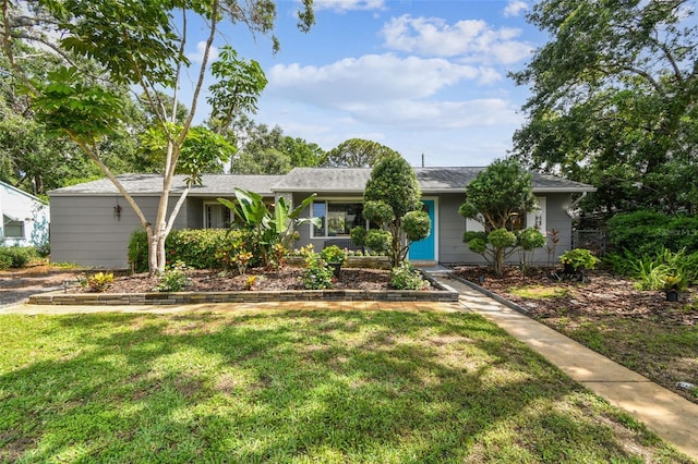 7219 4th Ave N, Saint Petersburg, FL 33710 - single story home featuring a front lawn
