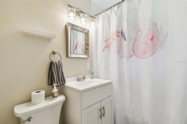 7219 4th Ave N, Saint Petersburg, FL 33710 - full bathroom with toilet, vanity, and a shower with shower curtain