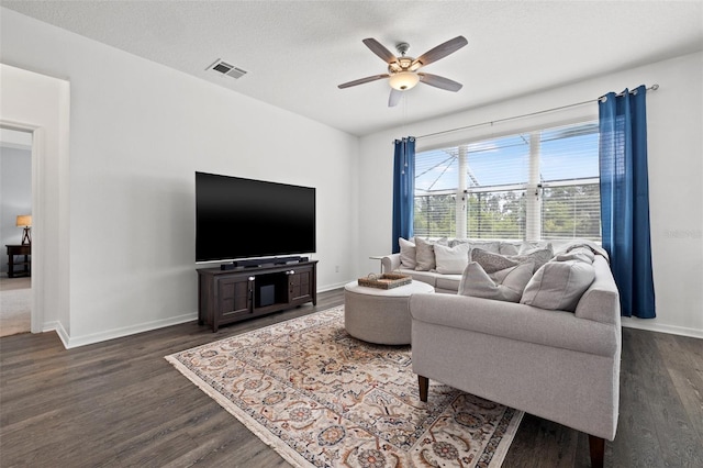 11434 Leland Groves Dr, Riverview, FL 33579 - living room with a ceiling fan and dark wood-style floors