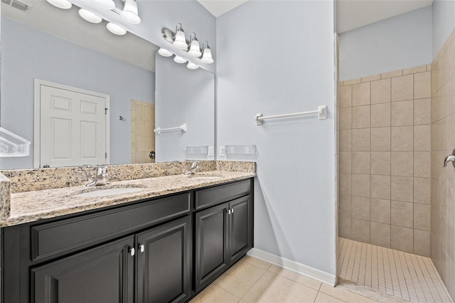 11434 Leland Groves Dr, Riverview, FL 33579 - full bath featuring double vanity, a tile shower, and tile patterned flooring