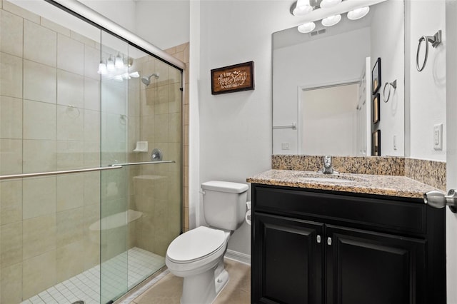 11434 Leland Groves Dr, Riverview, FL 33579 - bathroom featuring vanity, a stall shower, and tile patterned floors