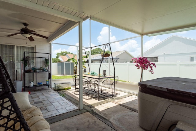 5826 Taywood Dr, Tampa, FL 33624 - sunroom with a hot tub, vaulted ceiling, a ceiling fan, and outdoor dining space