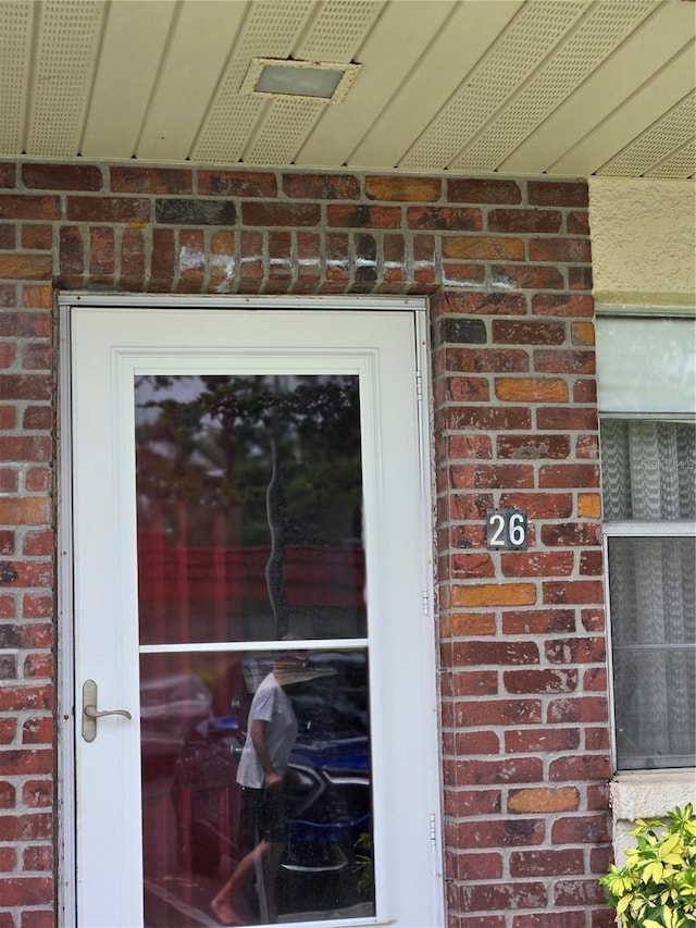 5865 37th Ave N Unit 26, Saint Petersburg, FL 33710 - view of exterior entry with brick siding