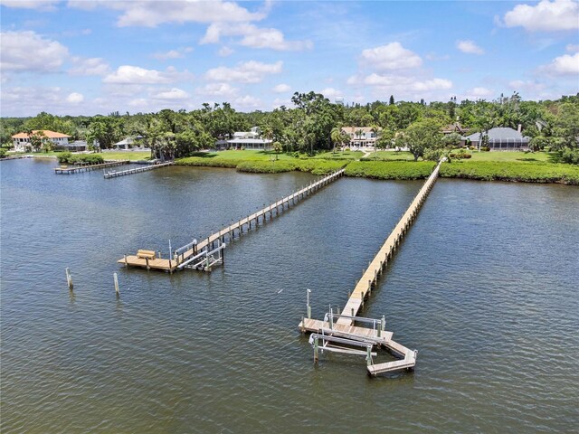 7705 4th Ave W, Bradenton, FL 34209 - dock with a water view and view of scattered trees