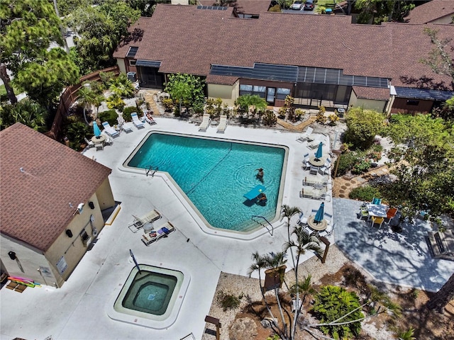 7705 4th Ave W, Bradenton, FL 34209 - community pool with a hot tub and a patio area