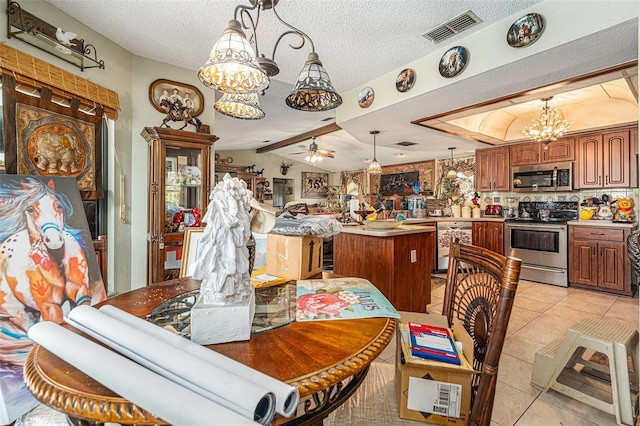 159 Canby Cir, Spring Hill, FL 34606 - dining space featuring a chandelier, ceiling fan, a textured ceiling, light tile patterned floors, and lofted ceiling