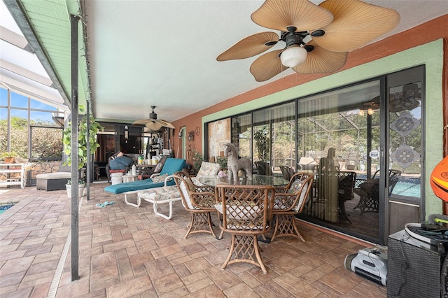 159 Canby Cir, Spring Hill, FL 34606 - view of patio / terrace featuring ceiling fan, outdoor dining area, and glass enclosure