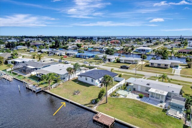 551 Lindley Ter, Port Charlotte, FL 33952 - aerial perspective of suburban area featuring a large body of water