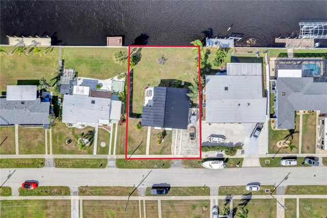 551 Lindley Ter, Port Charlotte, FL 33952 - aerial view of property and surrounding area with property parcel outlined