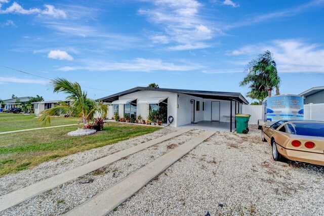 551 Lindley Ter, Port Charlotte, FL 33952 - view of front of home with driveway