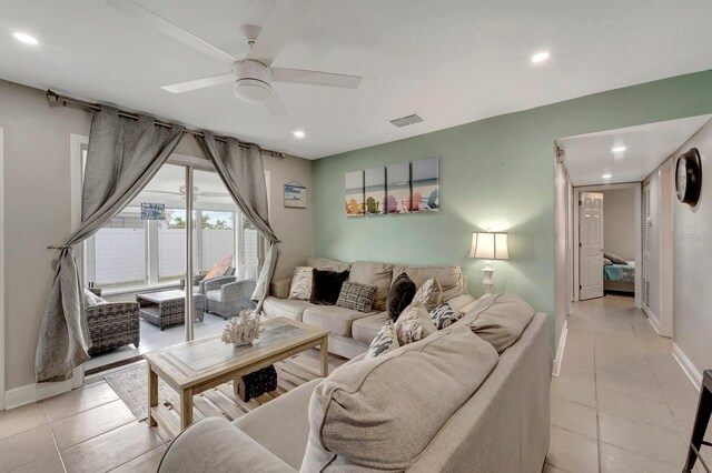 551 Lindley Ter, Port Charlotte, FL 33952 - living area featuring light tile patterned floors, ceiling fan, baseboards, and recessed lighting