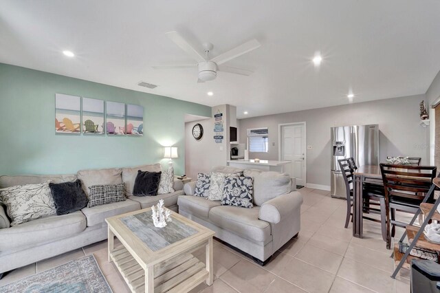 551 Lindley Ter, Port Charlotte, FL 33952 - living area featuring light tile patterned floors, a ceiling fan, and recessed lighting