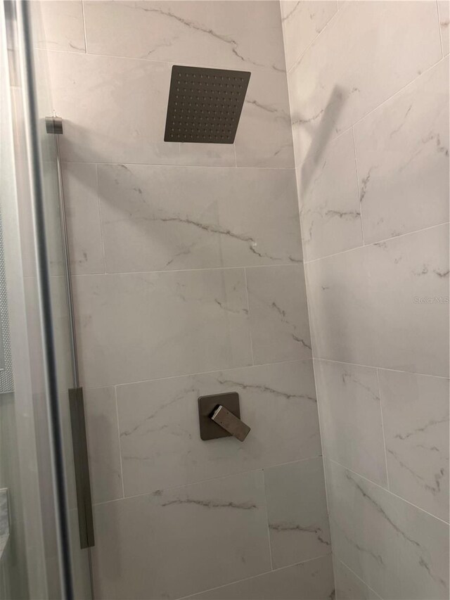 551 Lindley Ter, Port Charlotte, FL 33952 - bathroom view of a marble finish shower