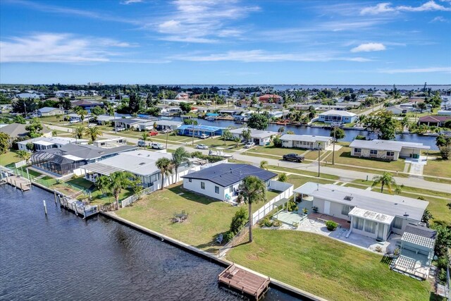 551 Lindley Ter, Port Charlotte, FL 33952 - aerial view of residential area with a nearby body of water