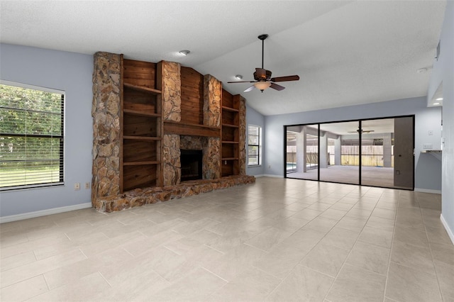 14164 Fennsbury Dr, Tampa, FL 33624 - unfurnished living room with a ceiling fan, healthy amount of natural light, lofted ceiling, and baseboards