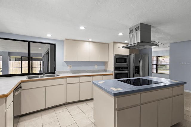 14164 Fennsbury Dr, Tampa, FL 33624 - kitchen featuring stainless steel appliances, a sink, island range hood, tile counters, and recessed lighting
