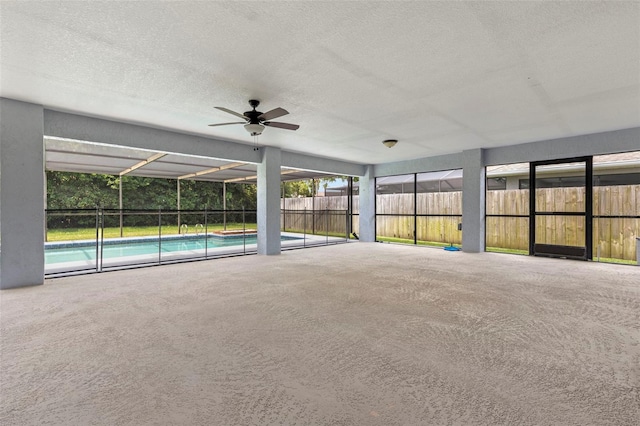 14164 Fennsbury Dr, Tampa, FL 33624 - view of pool featuring a lanai, a patio, a fenced backyard, and a ceiling fan