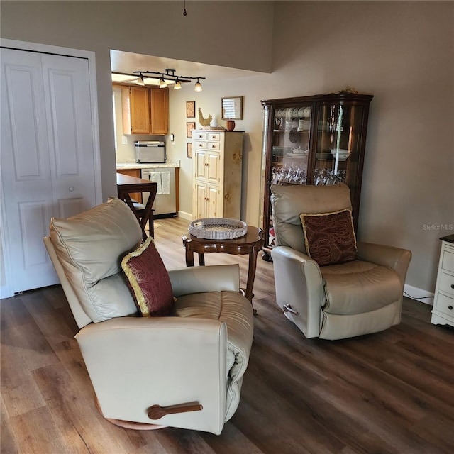 5119 Hector Ct, Tampa, FL 33624 - living area with wood finished floors and baseboards