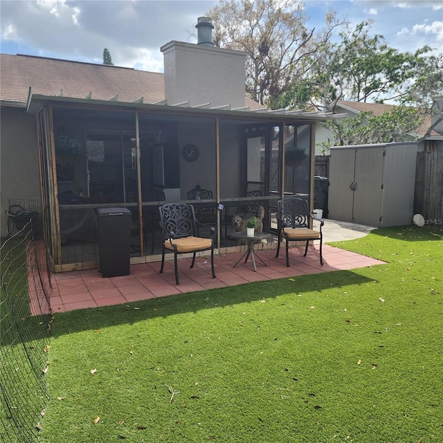 5119 Hector Ct, Tampa, FL 33624 - back of house featuring a patio, a chimney, a sunroom, and roof with shingles