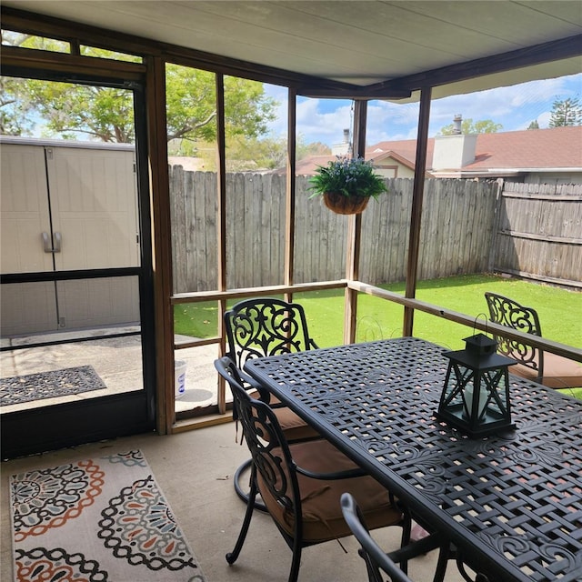 5119 Hector Ct, Tampa, FL 33624 - sunroom with outdoor dining area
