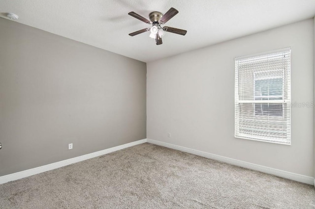1553 Amber Leaf Cir, Ocoee, FL 34761 - unfurnished room featuring ceiling fan, carpet floors, baseboards, and a smoke detector