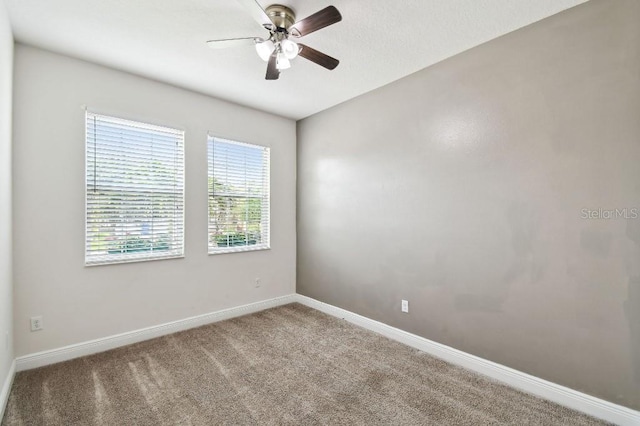 1553 Amber Leaf Cir, Ocoee, FL 34761 - unfurnished room with carpet floors, baseboards, and a ceiling fan