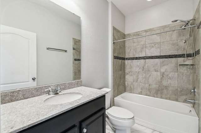 1553 Amber Leaf Cir, Ocoee, FL 34761 - full bathroom featuring vanity, toilet, shower / bathtub combination, and marble finish floors