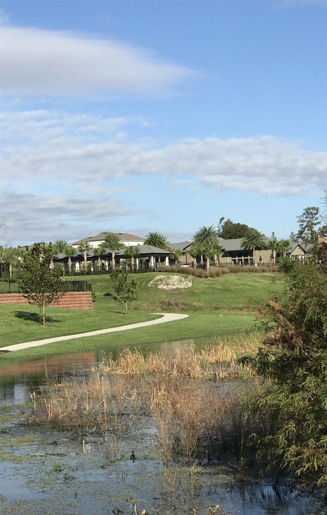 1553 Amber Leaf Cir, Ocoee, FL 34761 - view of property's community with a yard and a water view