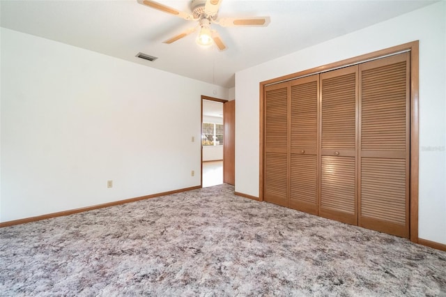 201 W New York Ave, Orange City, FL 32763 - unfurnished bedroom featuring carpet flooring, a closet, and ceiling fan