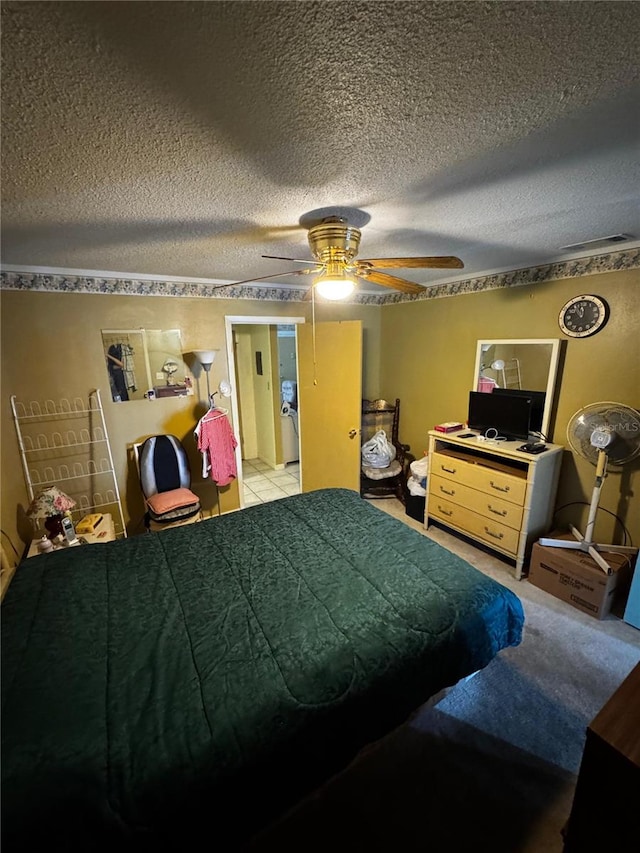 5247 81st St N Unit 2, Saint Petersburg, FL 33709 - bedroom featuring a textured ceiling and a ceiling fan