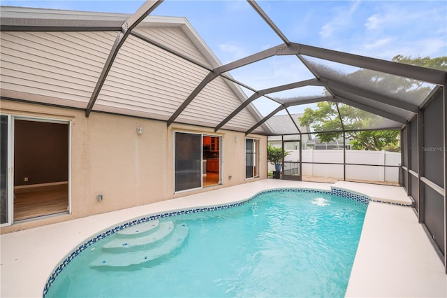 826 Addison Dr NE, Saint Petersburg, FL 33716 - outdoor pool with a patio area and glass enclosure