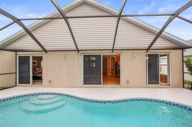 826 Addison Dr NE, Saint Petersburg, FL 33716 - outdoor pool with glass enclosure and a patio